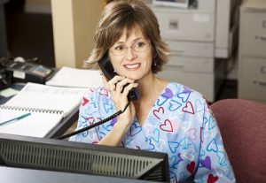 chiropractic-insurance-billing-service-woman-on-the-phone